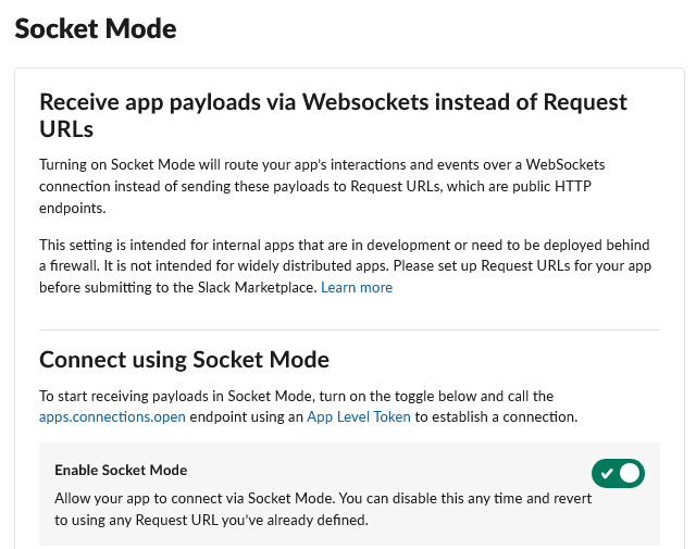 The Slack app’s Socket Mode page: an explanation that payloads arrive over WebSockets instead of public Request URLs, and the Enable Socket Mode toggle switched on